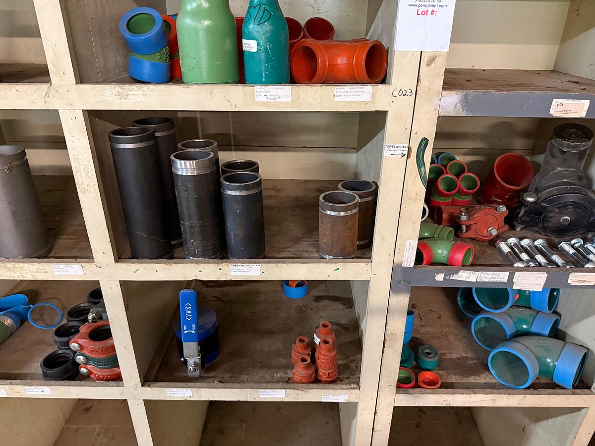 Used SECTION OF MOSTLY HEAVY WALL PVC & STEEL FITTINGS, VICTAULIC COUPLERS, SWAGES, COLLARS, NIPPLES, (3) 2” JAYCO VENT VALVES
