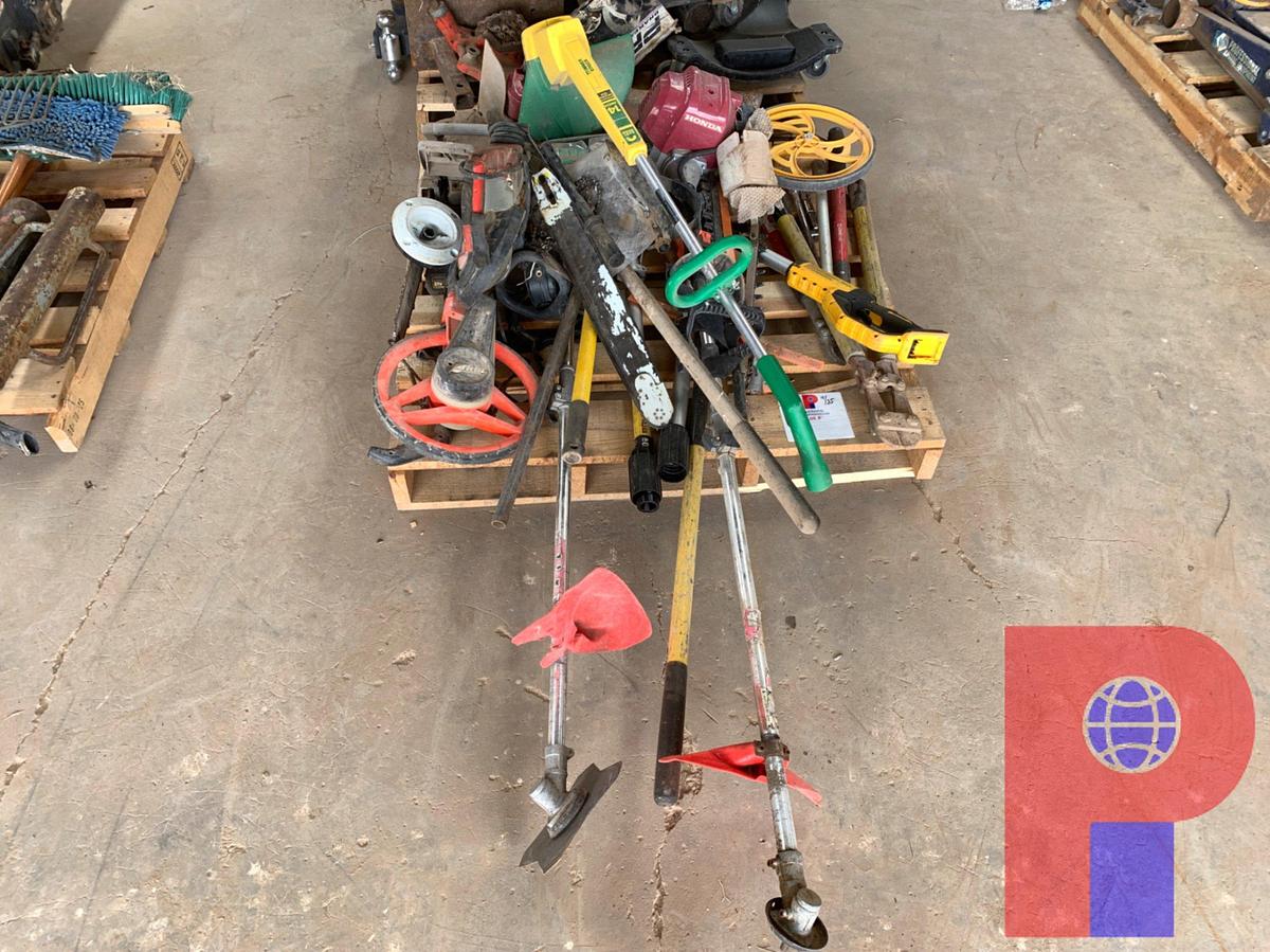 Used CHAINSAWS, WEED EATERS, POLE SAW, BANDSAW, ROLL OFF WHEEL