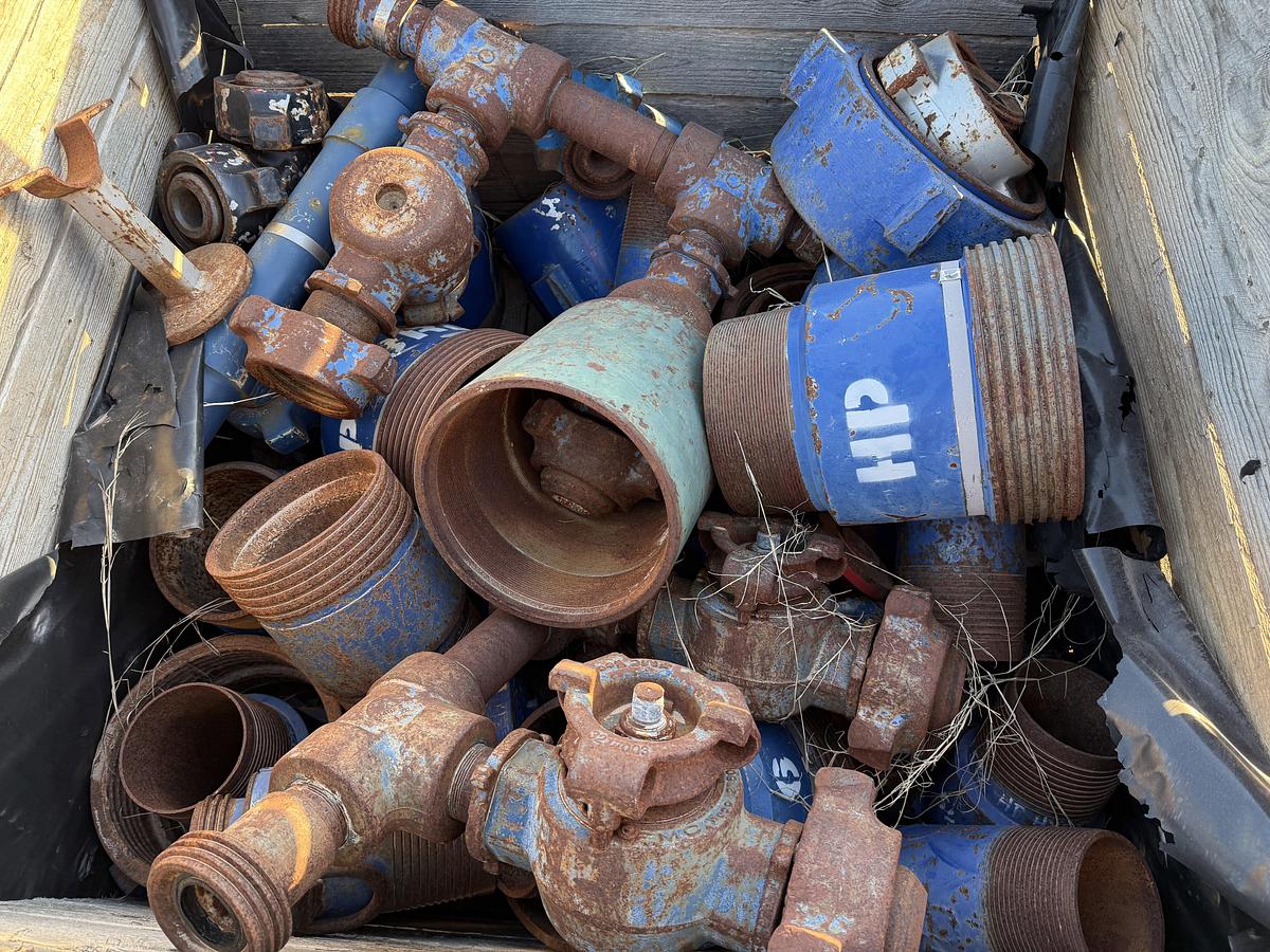 Used (1) TOTE & (1) CRATE W/ VARIOUS 2” & 3” FLOW IRON & CEMENT HEAD CONNS, CROSS OVERS, SUBS, PLUG VALVES, CHIKSANS, & RELATED