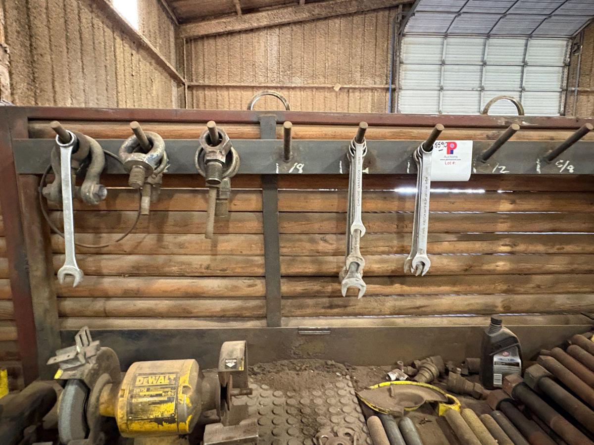 Used 8’ x 2’ x 3.5’ metal workbench w/ contents