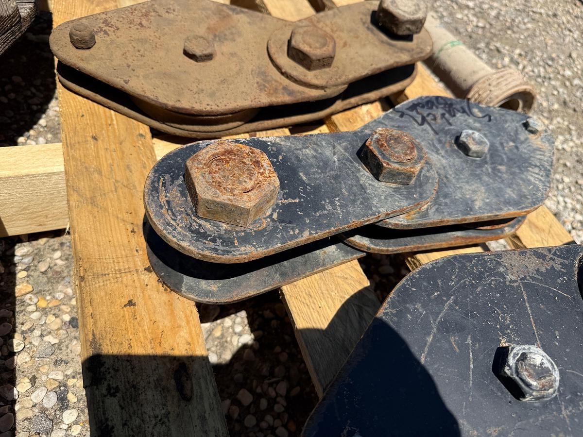 Used PALLET W/ (3) SNATCH BLOCKS & (1) SPOOL OF 1/2” WIRE ROPE