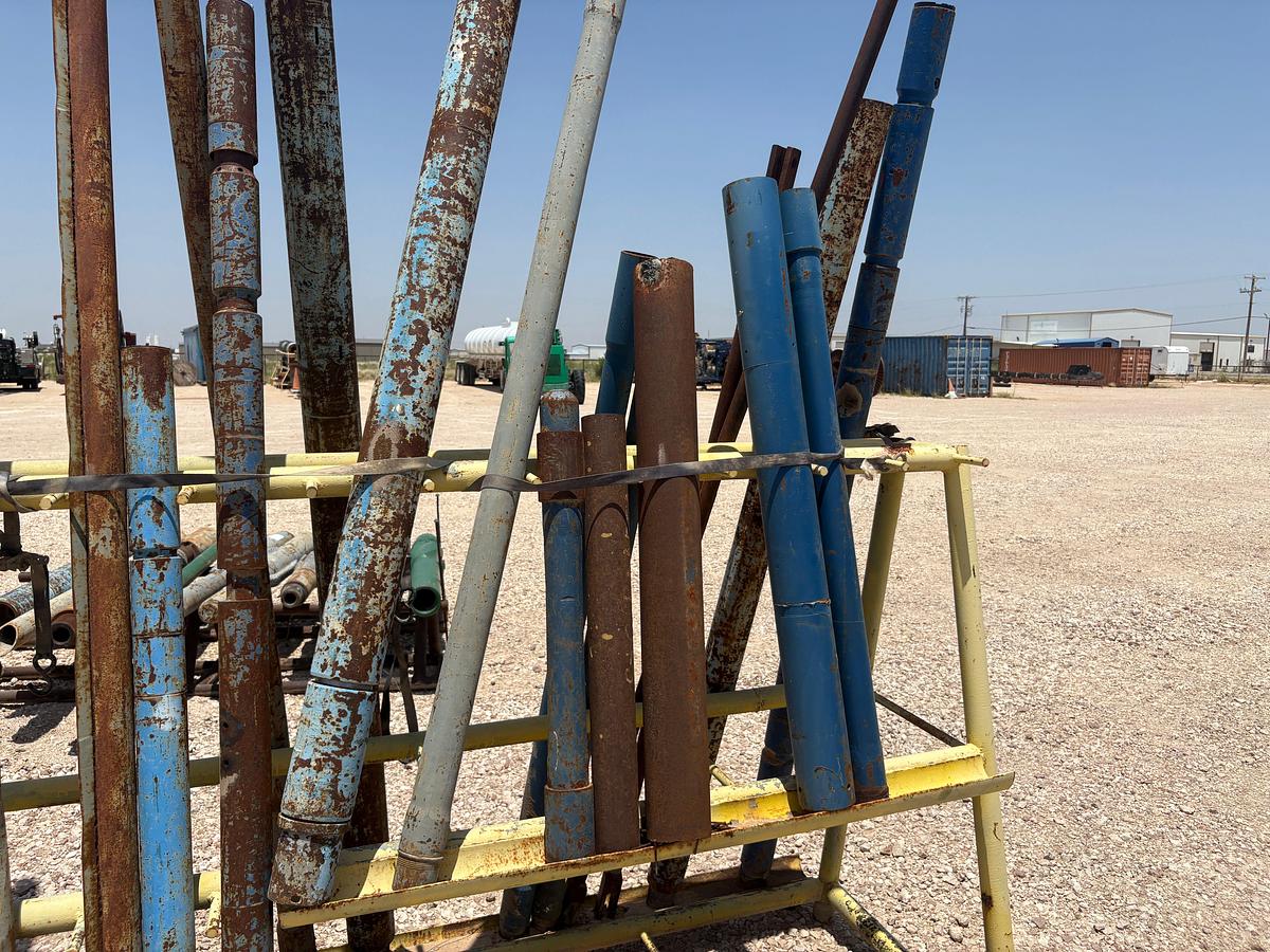 Used 10’ x 3.5’ x 5’ A-frame tool rack W/ assorted tubing pup jts, drain subs, stock pipe, etc.