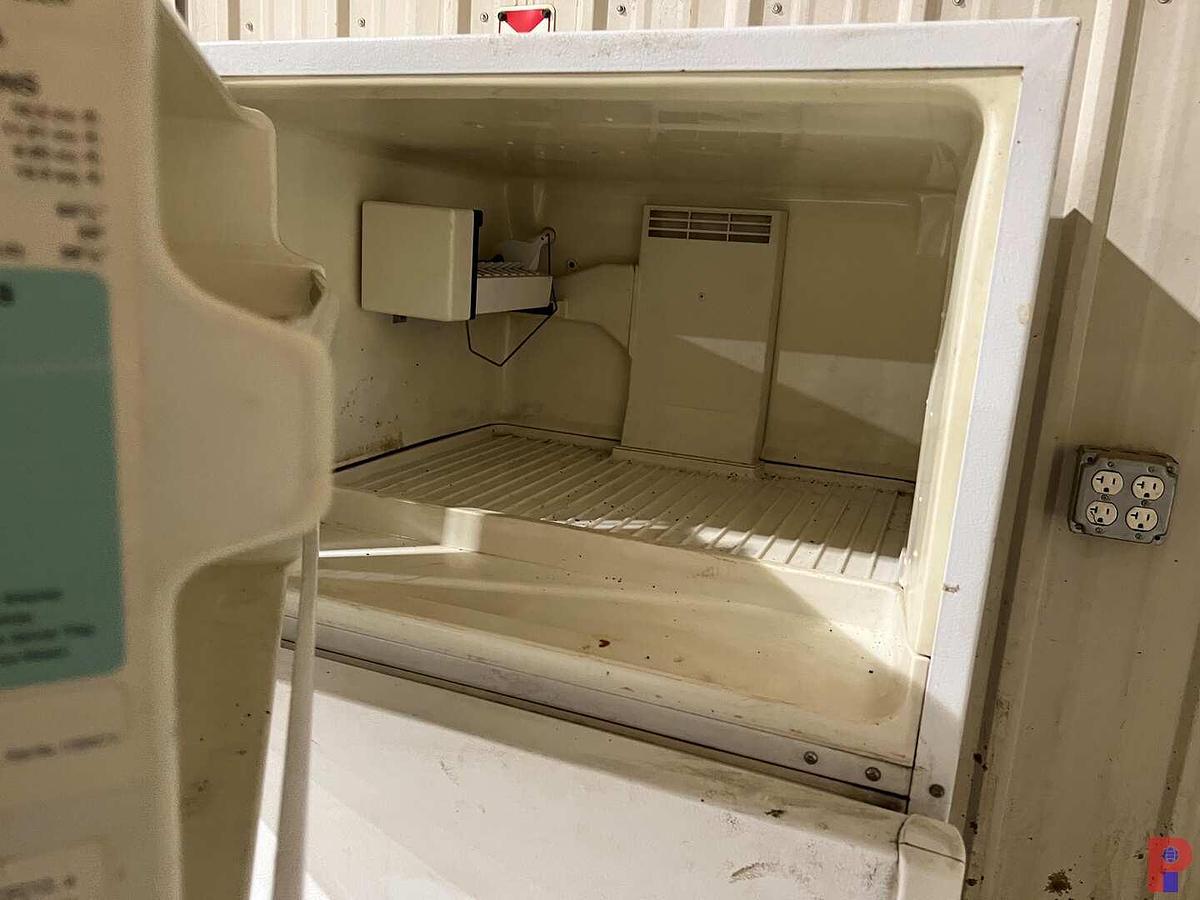 Used TWO PROPANE GRILLS W/ PROPANE BOTTLES, MAGIC CHEF REFRIGERATOR-FREEZER, FOUR PEAR BURNERS