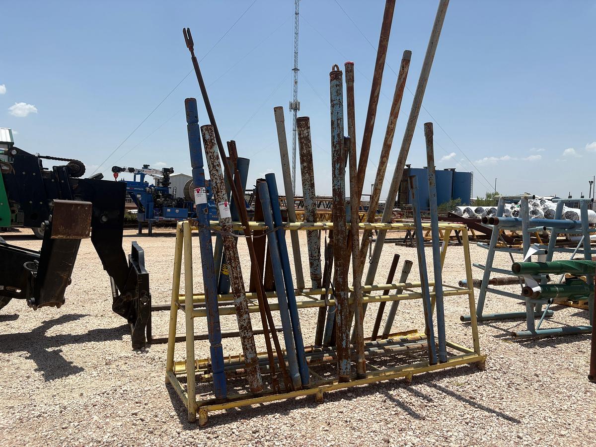 Used 10’ x 3.5’ x 5’ A-frame tool rack W/ assorted tubing pup jts, drain subs, stock pipe, etc.