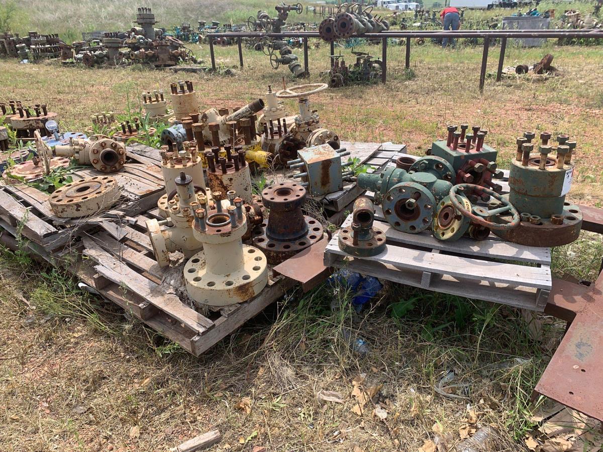Used Row of 2in Flange Adapters, Caps, DSA’s, 4-1/16 Plug Valves, 7-1/16 Casing Heads and 2in Fluid Crosses