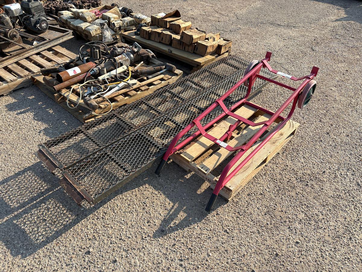Used Northern tool barrel dolly & set of (2) 8’ x 1’ trailer ramps