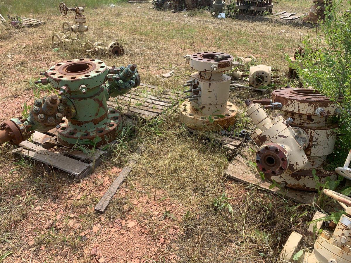 Used Row of 2in Flange Adapters, Caps, DSA’s, 4-1/16 Plug Valves, 7-1/16 Casing Heads and 2in Fluid Crosses