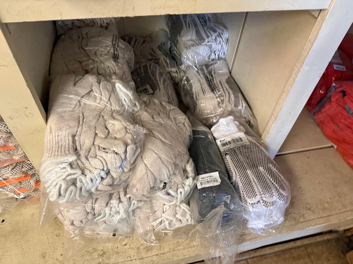 Used WALL SECTION (14) BOXES OF NITRILE GLOVES, (200+) PAIRS G-GRIP GLOVES, BLAKC DOT GLOVES, FLAME RESISTANT, ANIT-SEIZE, & RELATED