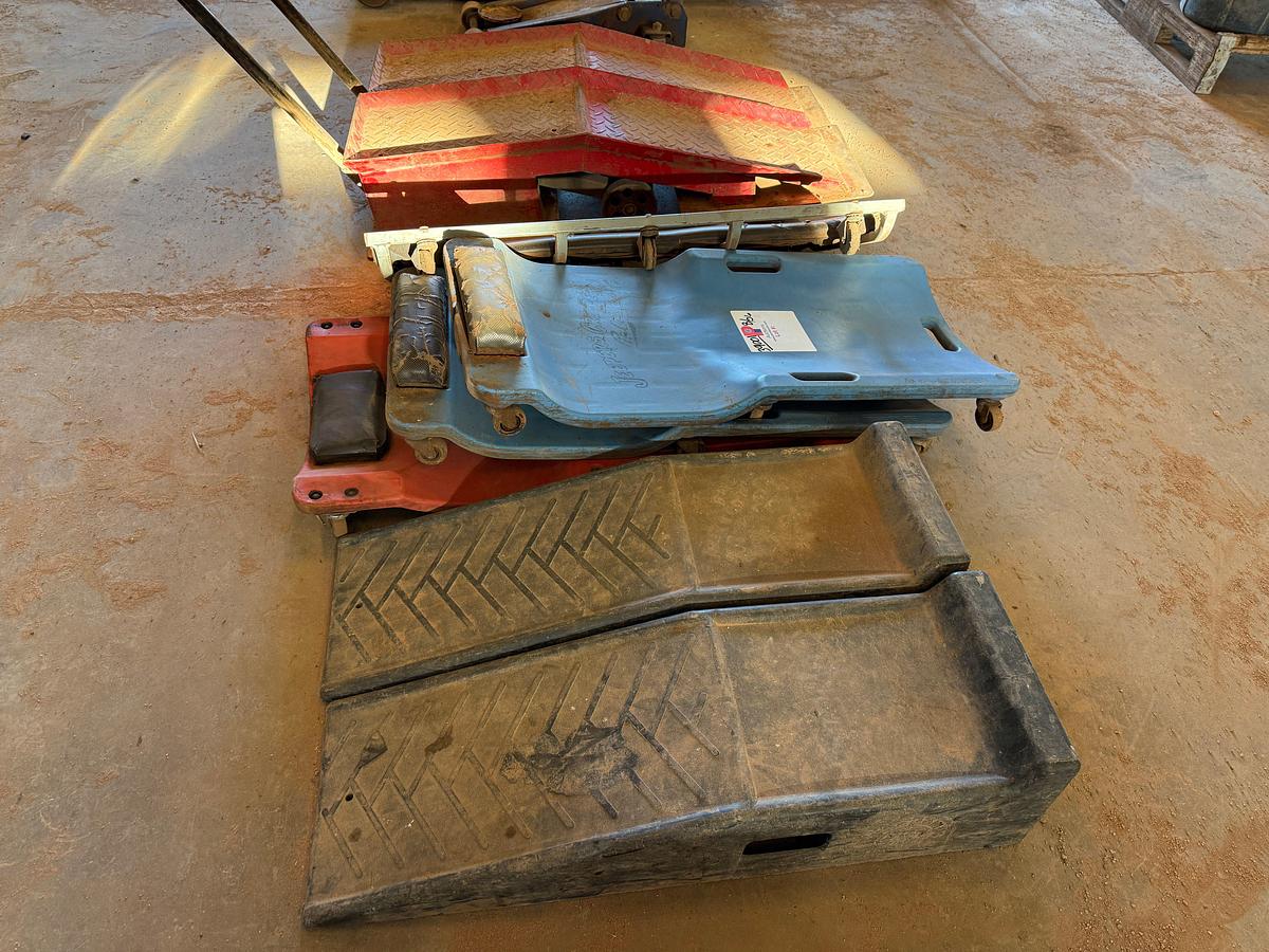 Used (2) WHEELED VEHICLE RAMPS, (2) SMALL RAMPS, (4) CREEPERS