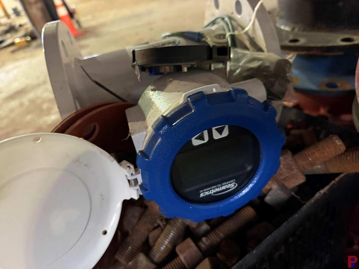 Used PALLET W/ (2) 10” HD WATER MANIFOLD FLANGES & SEAMETRICS 4” FLOW METER