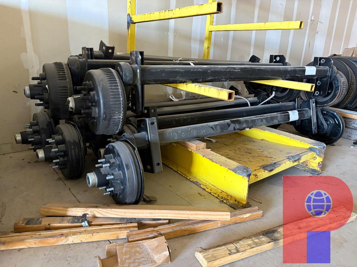 Used (6) 8-LUG 7,000LBS TORSION AXLES W/ STORAGE RACK