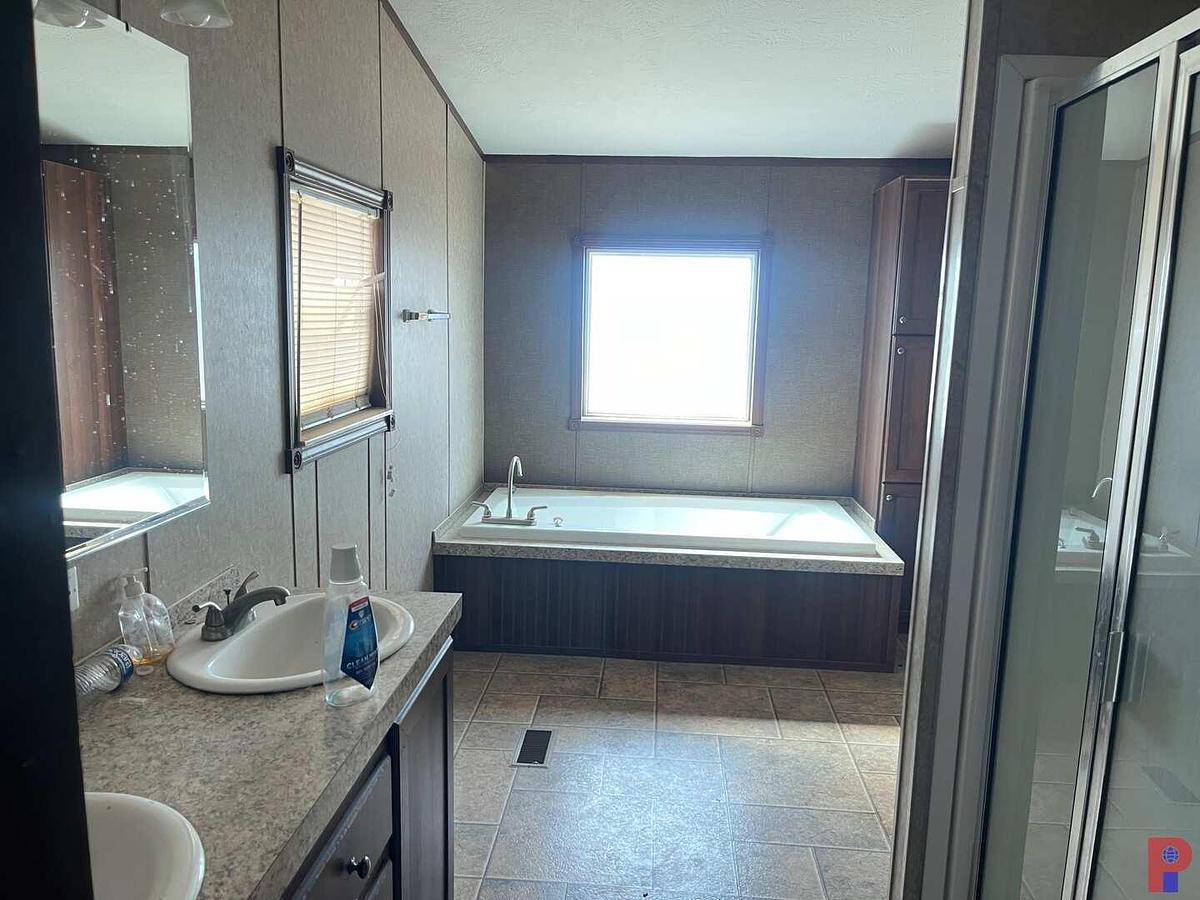 Used 2012 OAK CREEK 60’ X 30’ 4-BED 2-BATH DOUBLE WIDE MOBILE HOME