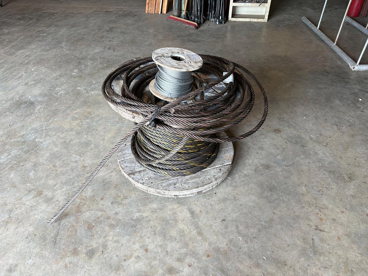 Used Spool of 7/8” wire rope & spool of 1/4” galvanized aircraft cable