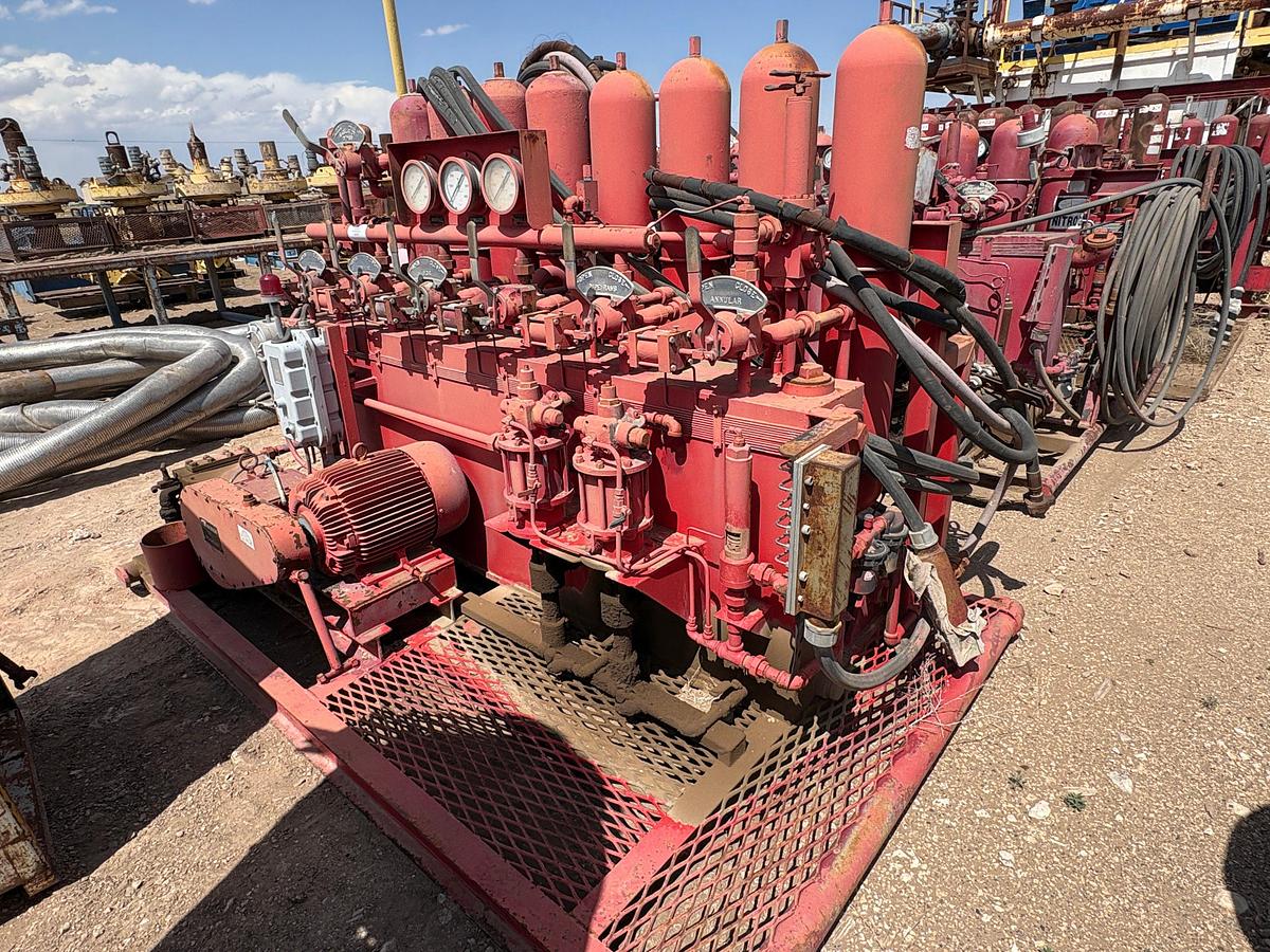 Used 6-station closing unit, skidded