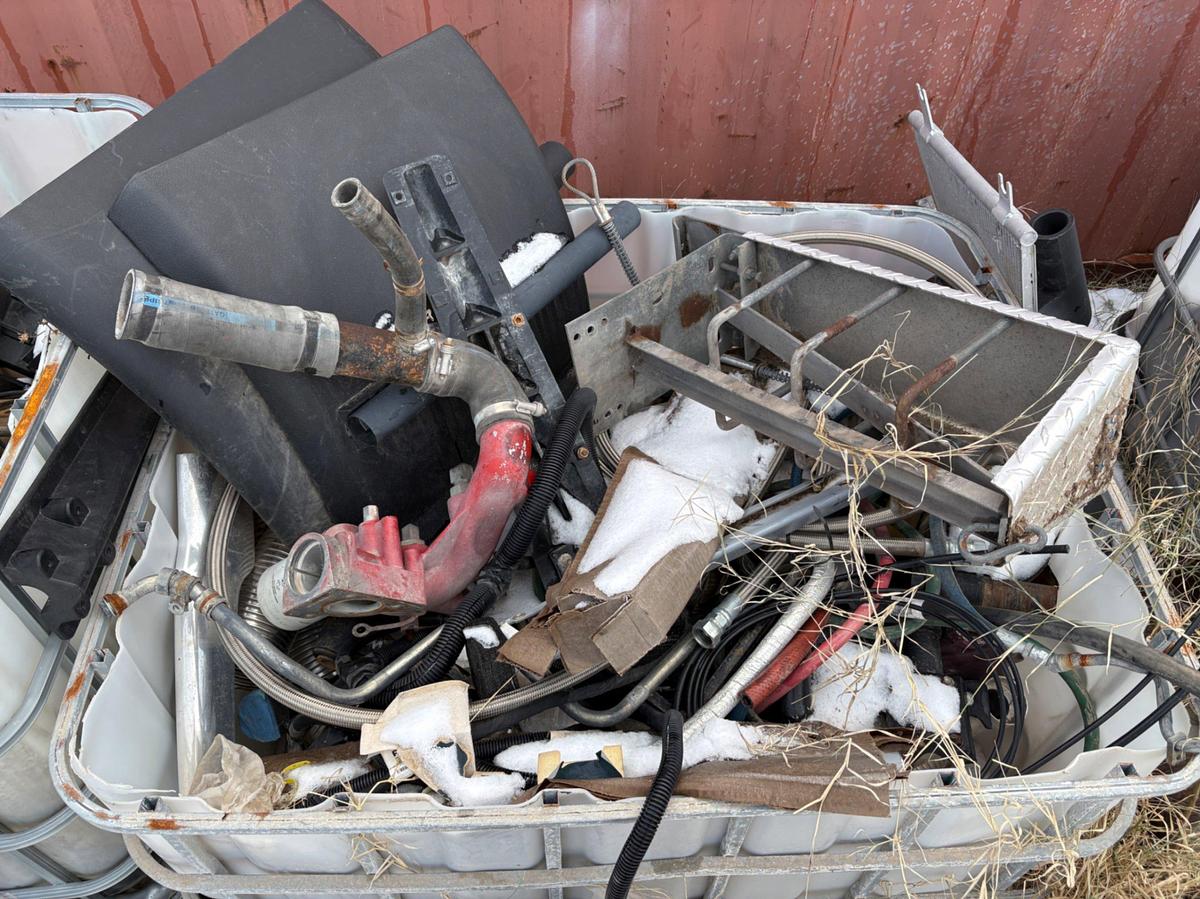 Used (5) totes of assorted truck parts