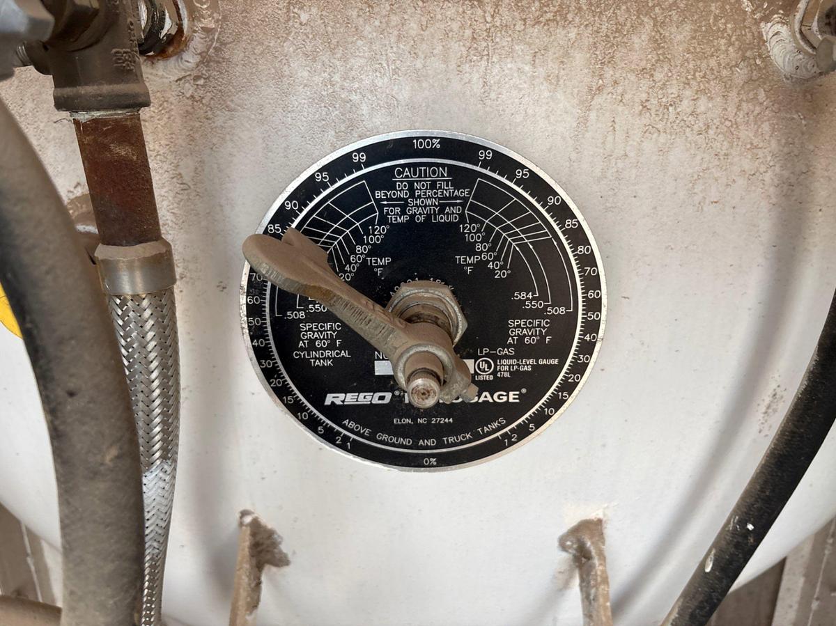 Used 18’ x 3.5’ x 70” 1,000 gallon propane tank, skidded