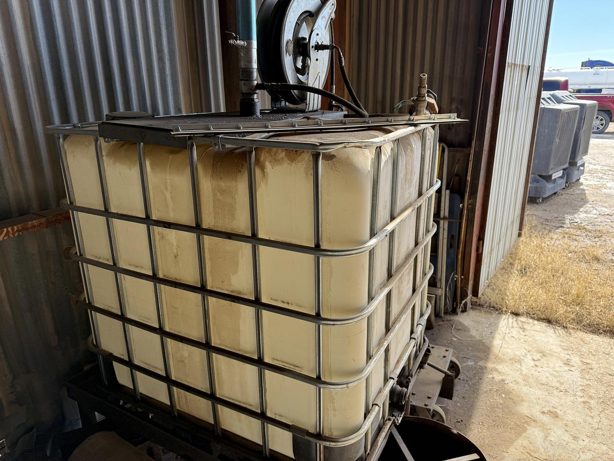 Used 44”L X 36”W X 40”H OIL TOTE W/ PNEUMATIC GUN HOSE REEL, & (2) OIL CATCH PANS