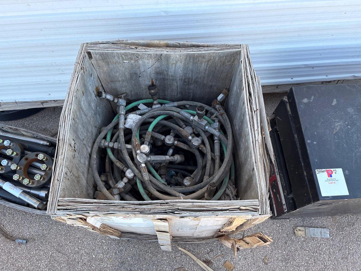 Used 4’ x 2’ x 2’ job box w/ contents & crate of assorted grease & hydraulic hoses