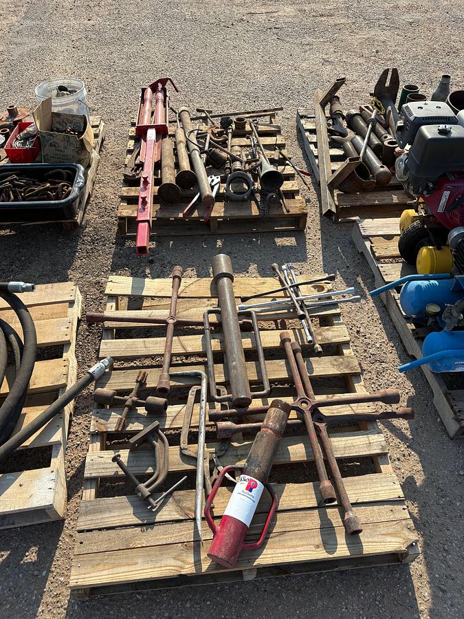 Used (2 pallets) w/ 4-way lug wrenches, winch fairlead, T-post drivers, c-clamps, etc
