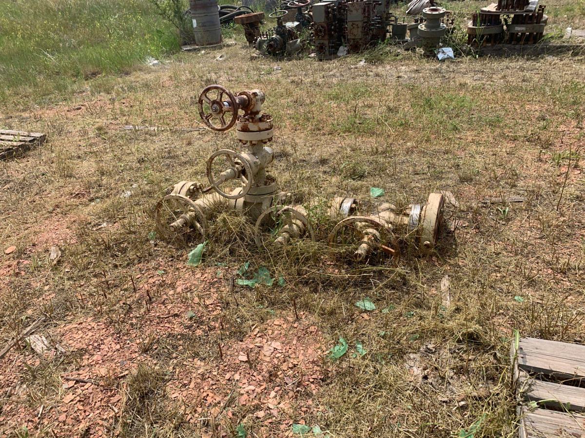 Used Row of 2in Flange Adapters, Caps, DSA’s, 4-1/16 Plug Valves, 7-1/16 Casing Heads and 2in Fluid Crosses