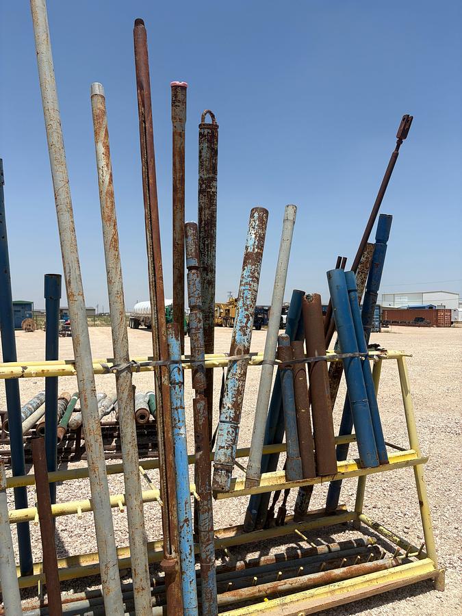 Used 10’ x 3.5’ x 5’ A-frame tool rack W/ assorted tubing pup jts, drain subs, stock pipe, etc.