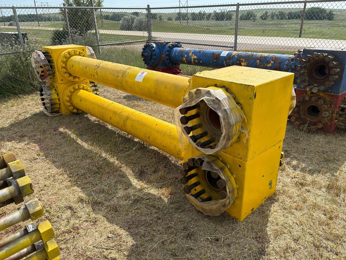 Used (2) 7-1/16” x 10’L spacer spools w/ (4) fluid crosses