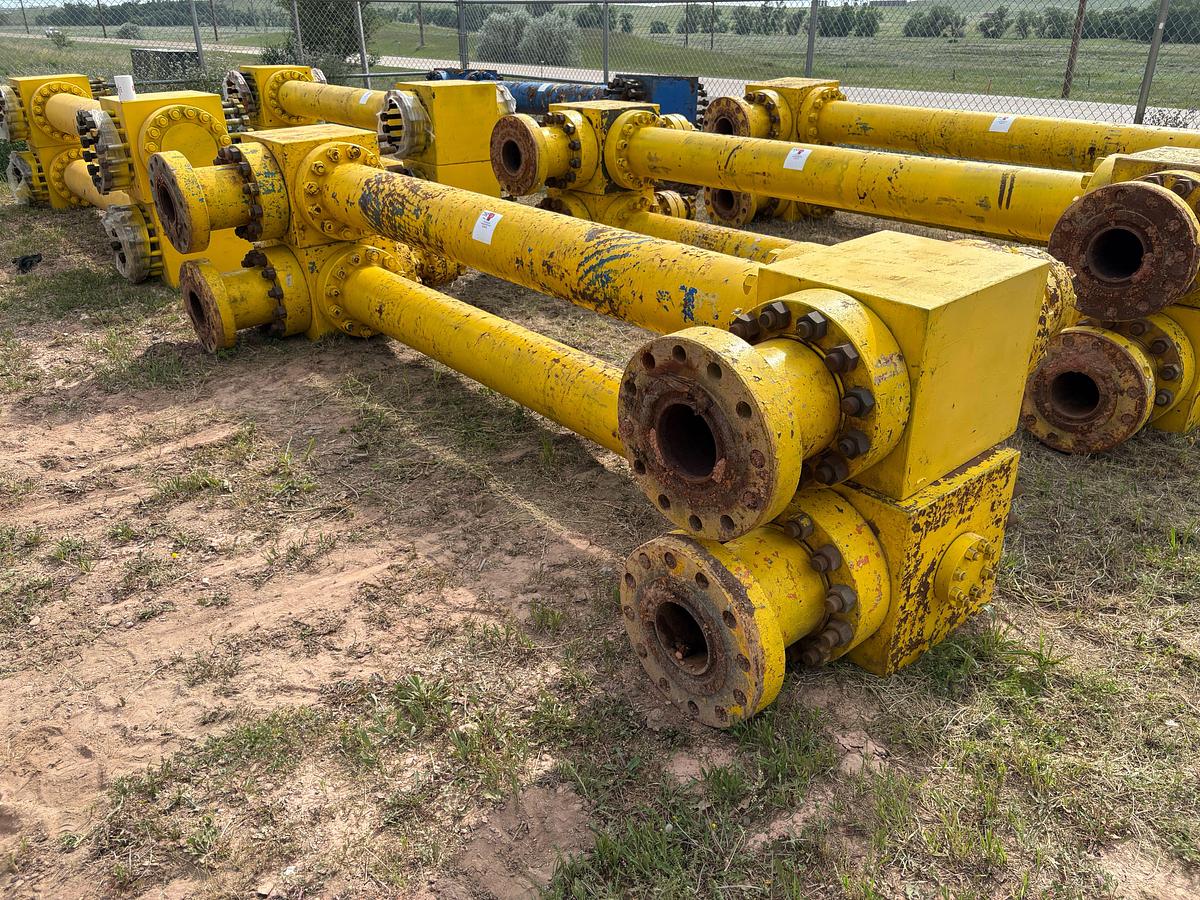 Used (2) 7-1/16” x 10’L spacer spools w/ (4) fluid crosses, (4) 20”l spools, & weco flanges