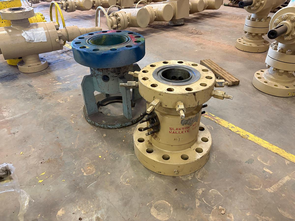Used (1) Braden tubing head & (1) casing head w/ baseplate