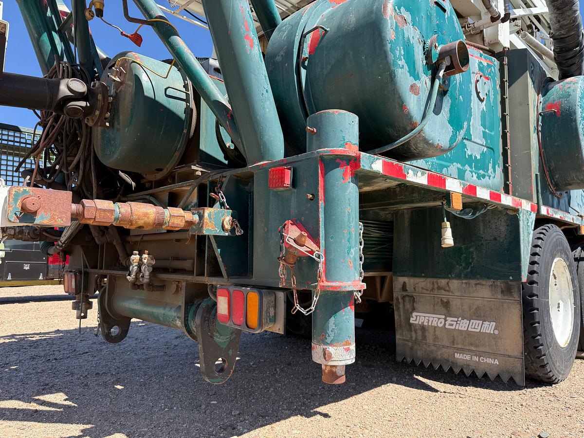 Used 2006 SJ PETRO XJ450 105’-303K LBS. 5-AXLE MOBILE DRILLING RIG