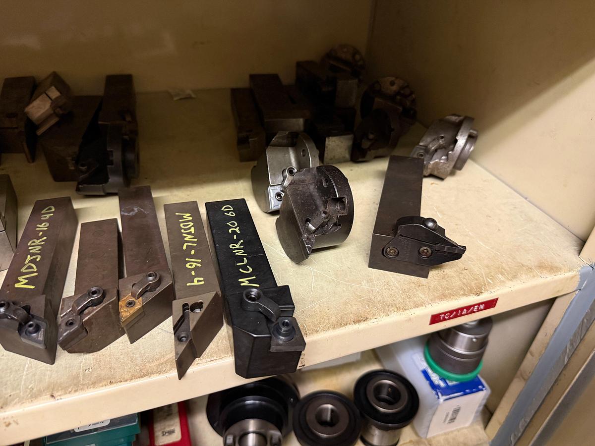Used ROOM W/ SHELVES & (2) DOOR CABINET INCLUDES (100+) MACHINE CUTTING TOOLS, SUPPLIES, SPARE PARTS, & RELATED