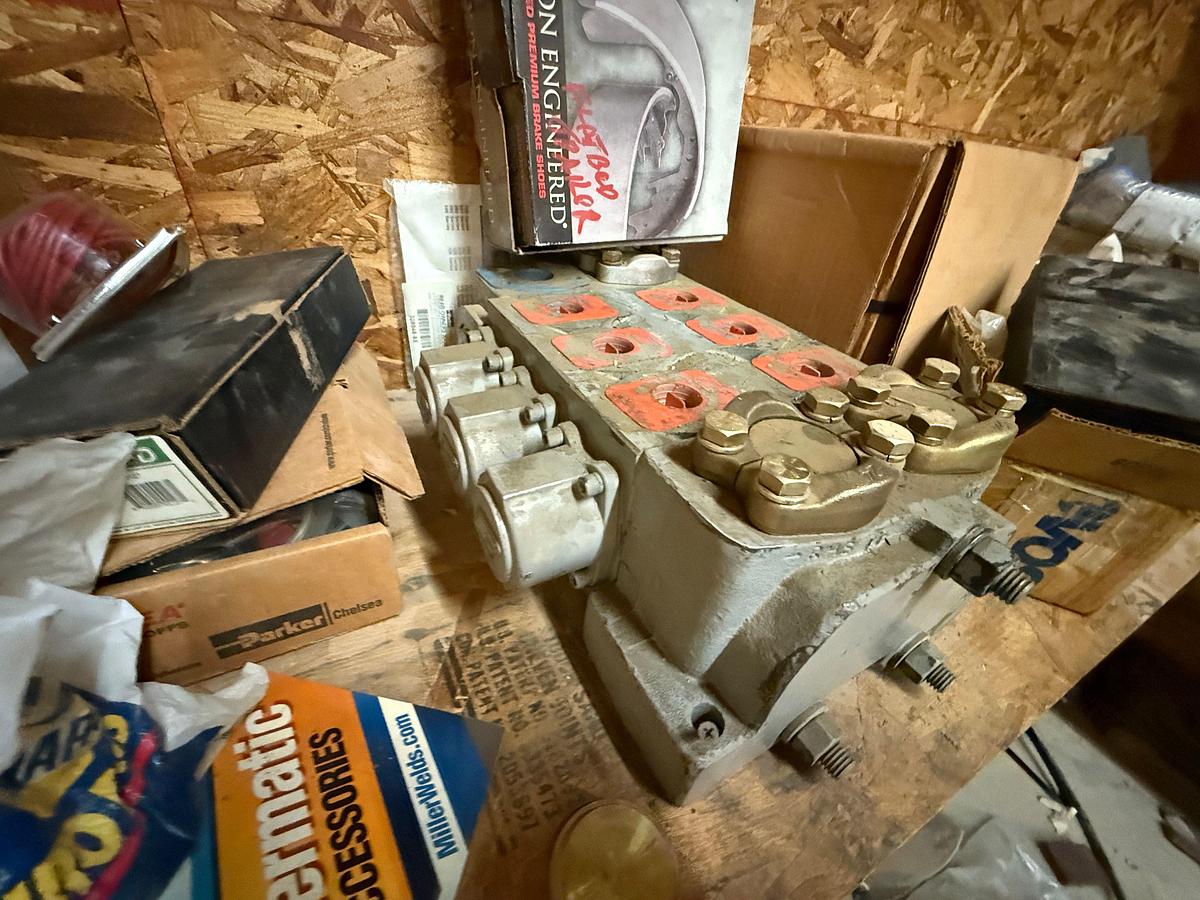 Used PARTS ROOM W/ CONTENTS OF, ROD ELEVATORS, SNATCH BLOCK, HYD VALVE BANK, (8) SHARK TOOTH BITS, JASK STANDS, FUEL PUMP, & RELATED