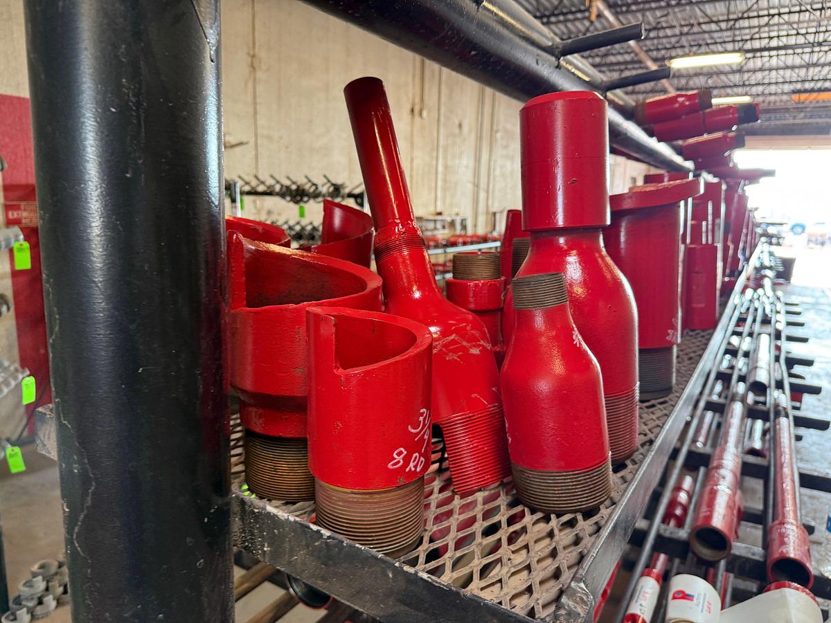 Used TOP RACK SHELF OF (30+) OVERSHOT CUT LIP GUIDES, SWAGES, COLLARS, SOME BOWLS & TOP SUBS