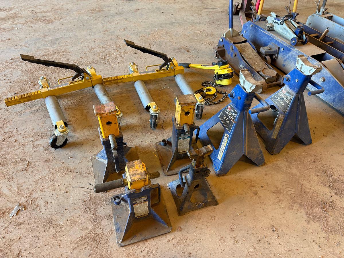 Used LOT OF (7) 2-TON TO 20-TON FLOOR JACKS, (1) 1-1/2 TON CHAIN HOIST, (2) DAYTONA WHEEL DOLLEYS, (6) 10-TON TO 22-TON JACK STANDS