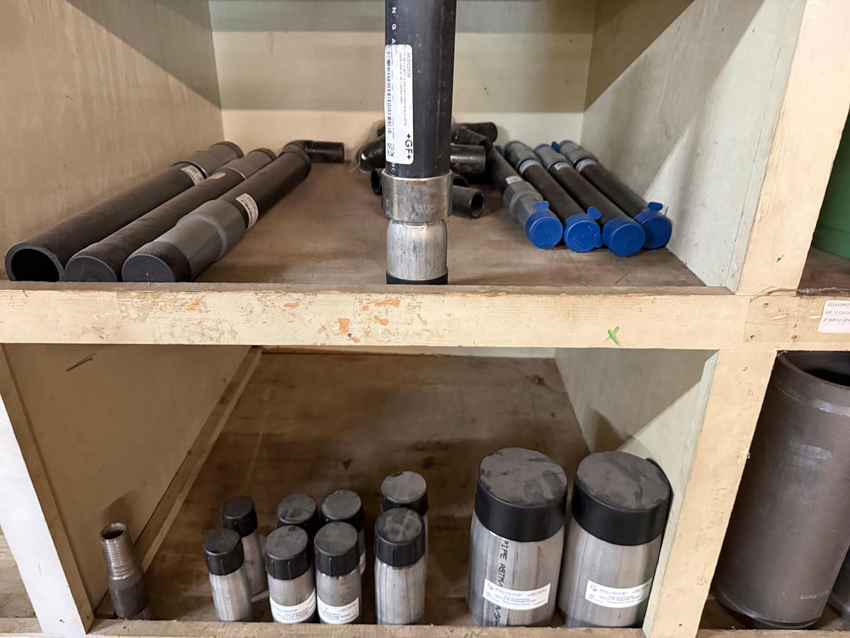 Used SECTION OF MOSTLY HEAVY WALL PVC & STEEL FITTINGS, VICTAULIC COUPLERS, SWAGES, COLLARS, NIPPLES, (3) 2” JAYCO VENT VALVES