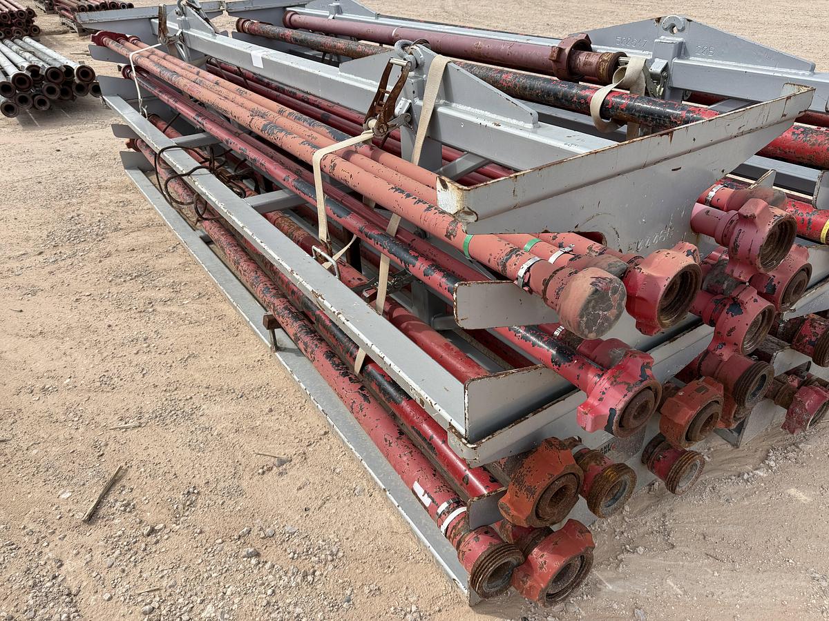 Used (18 X $) (10) 2” X 15’L & (8) 3” X 15’L FIG 1502 15K WP FLOW IRON W/ (2) 2-TIER STACKABLE PIPE RACKS