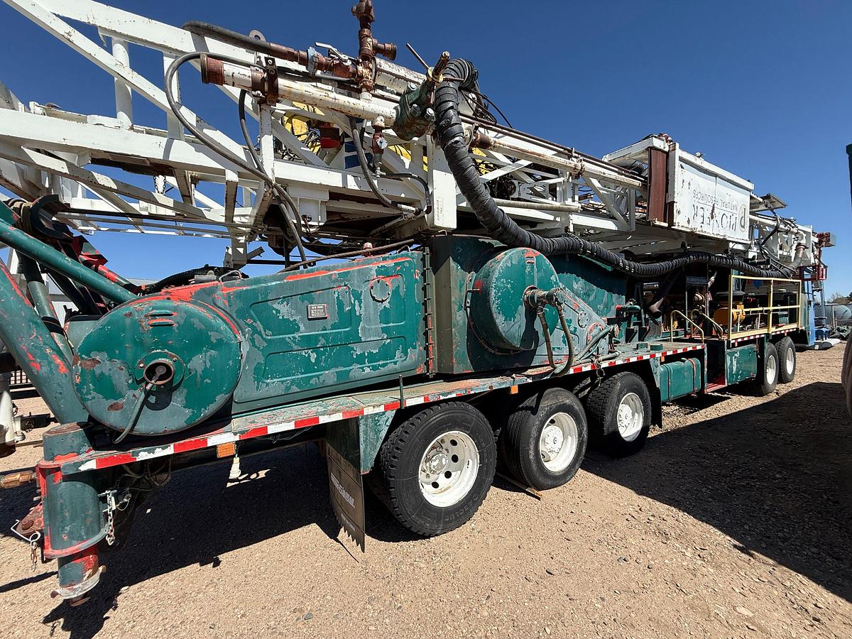 Used 2006 SJ PETRO XJ450 105’-303K LBS. 5-AXLE MOBILE DRILLING RIG