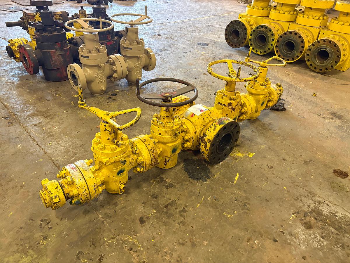 Used 7-1/16” x 3-1/8” fluid cross w/ (4) 3-1/8” 5k gate valves