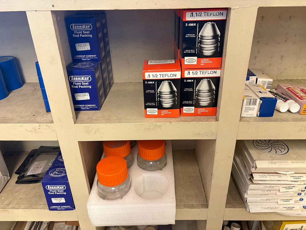 Used 18-bin shelf w/ contents