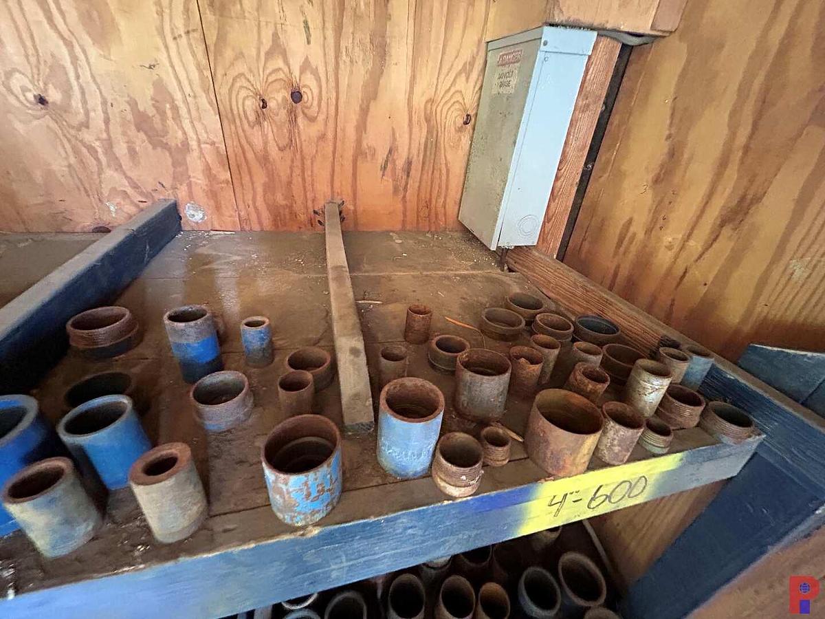 Used 2-SHELVES W/ (60 +) 1-1/2” - 8” STEEL THREAD PROTECTORS