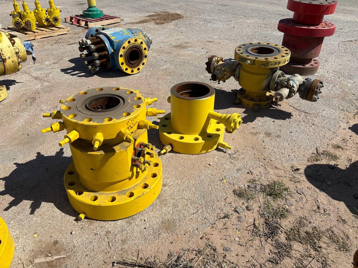 Used (2) 7-1/16” tubing heads & (1) 11” well head