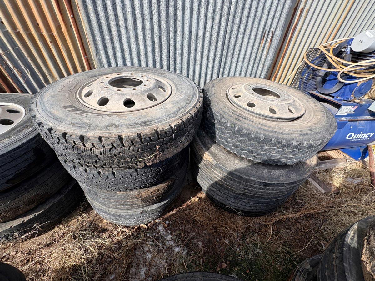 Used (11) 11r22.5 tires w/ (15) 10-lug aluminum wheels