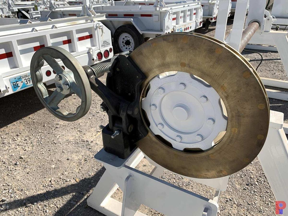 Used 66”W X 48”H REEL STAND W/ ADJUSTABLE 16” BRAKE CALIPER