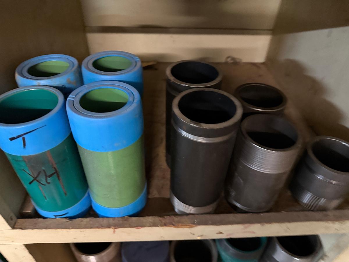 Used SECTION OF MOSTLY HEAVY WALL PVC & STEEL FITTINGS, VICTAULIC COUPLERS, SWAGES, COLLARS, NIPPLES, (3) 2” JAYCO VENT VALVES