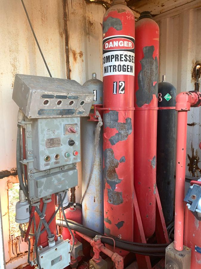 Used 18’ L x 8’ W x 9’4” T Skidded BOP Closing Unit