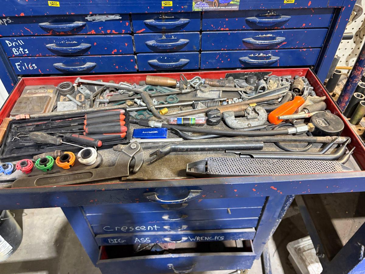 Used 34” x 18” x 60” tool box w/ contents