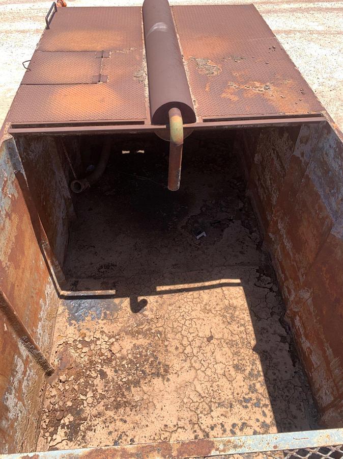 Used 21’ L x 9’ W x 8’ T 115 Bbl Open Top Skidded Tank