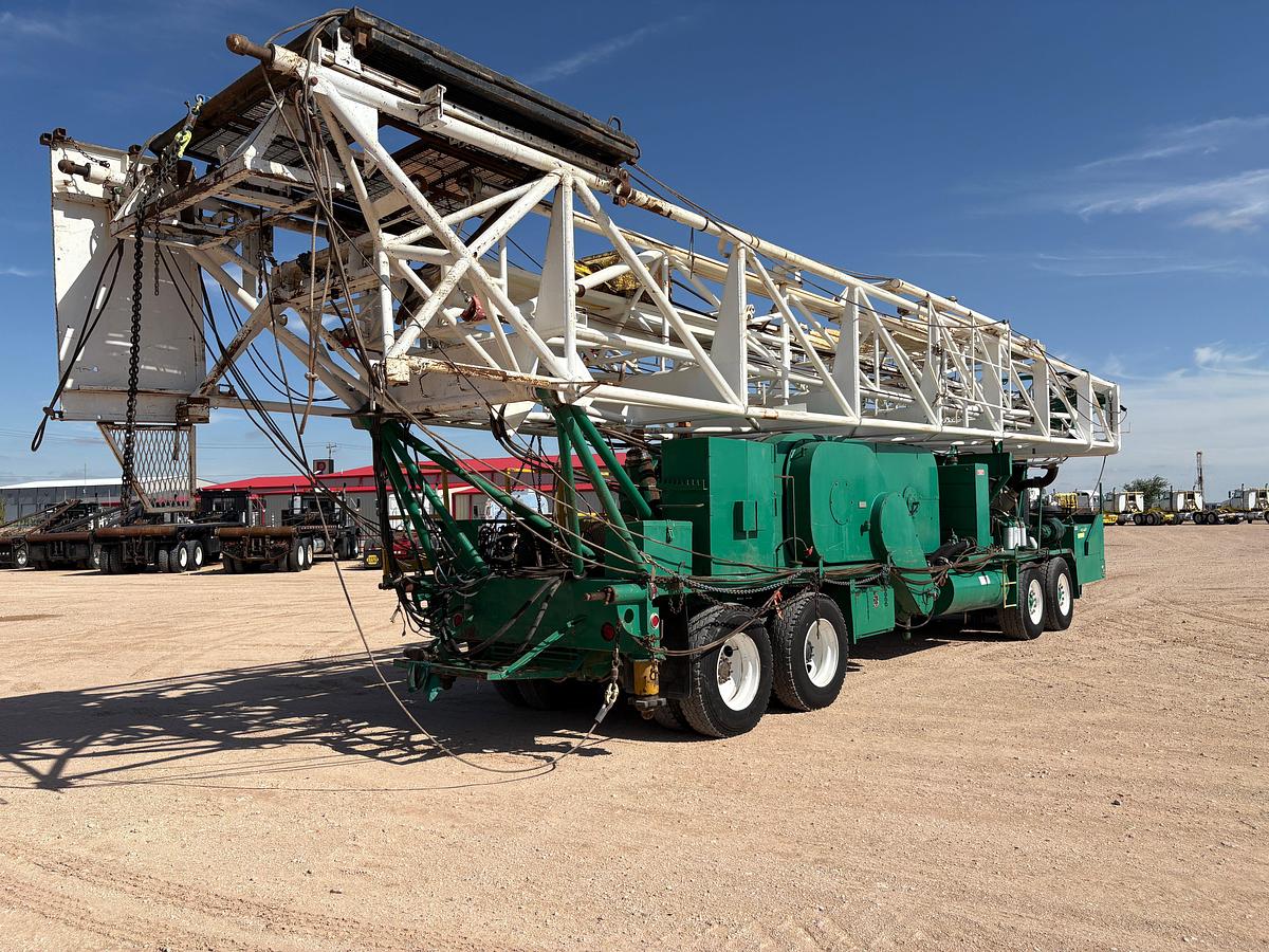 Used FRANKS 1287 EXPLORER III 4-AXLE WELL SERVICE RIG (96' MAST)