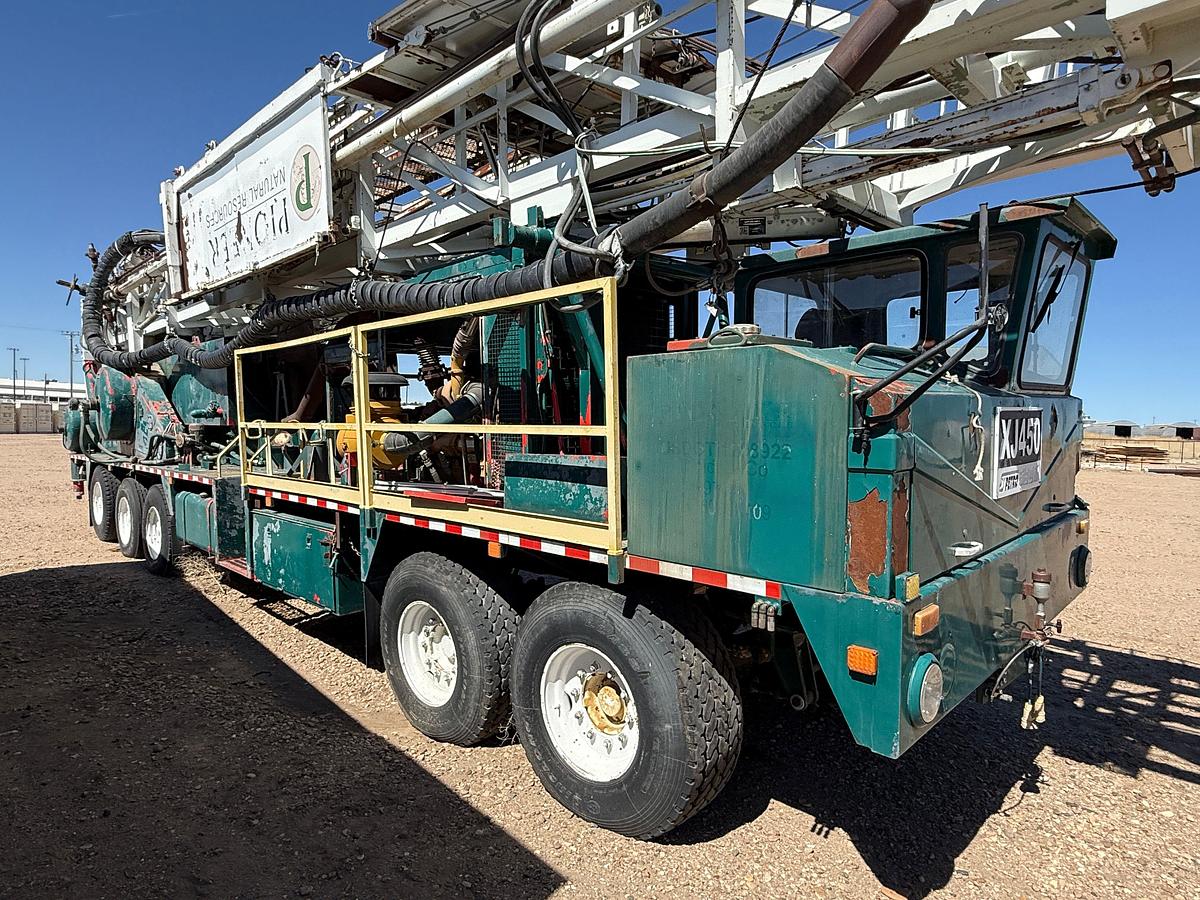 Used 2006 SJ PETRO XJ450 105’-303K LBS. 5-AXLE MOBILE DRILLING RIG