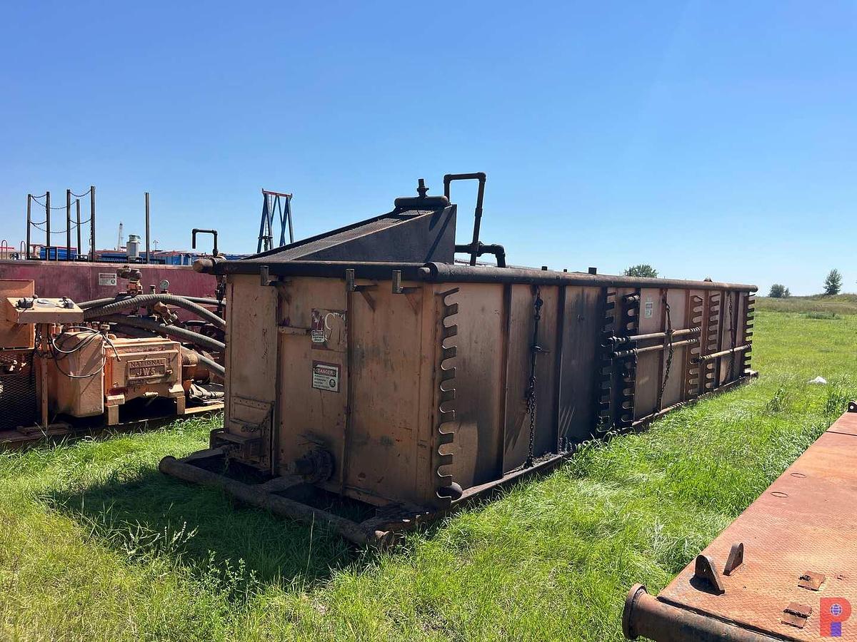 Used 30’ X 8’ X 5’ 2-COMPARTMENTS MUD TANK W/ FLOW IRON & RACKS