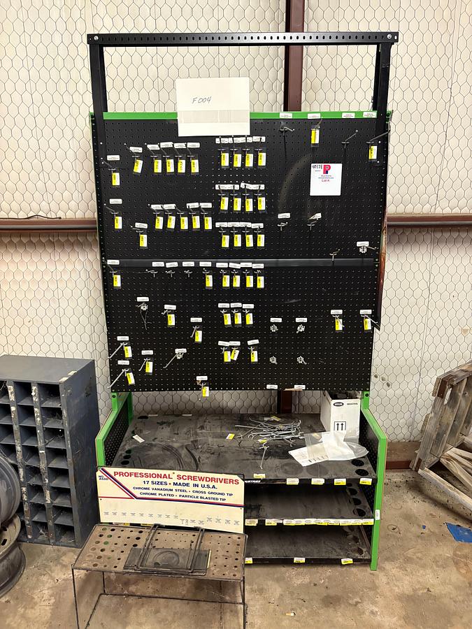 Used Display peg board, bolt bin, & (2) 5-lug wheels